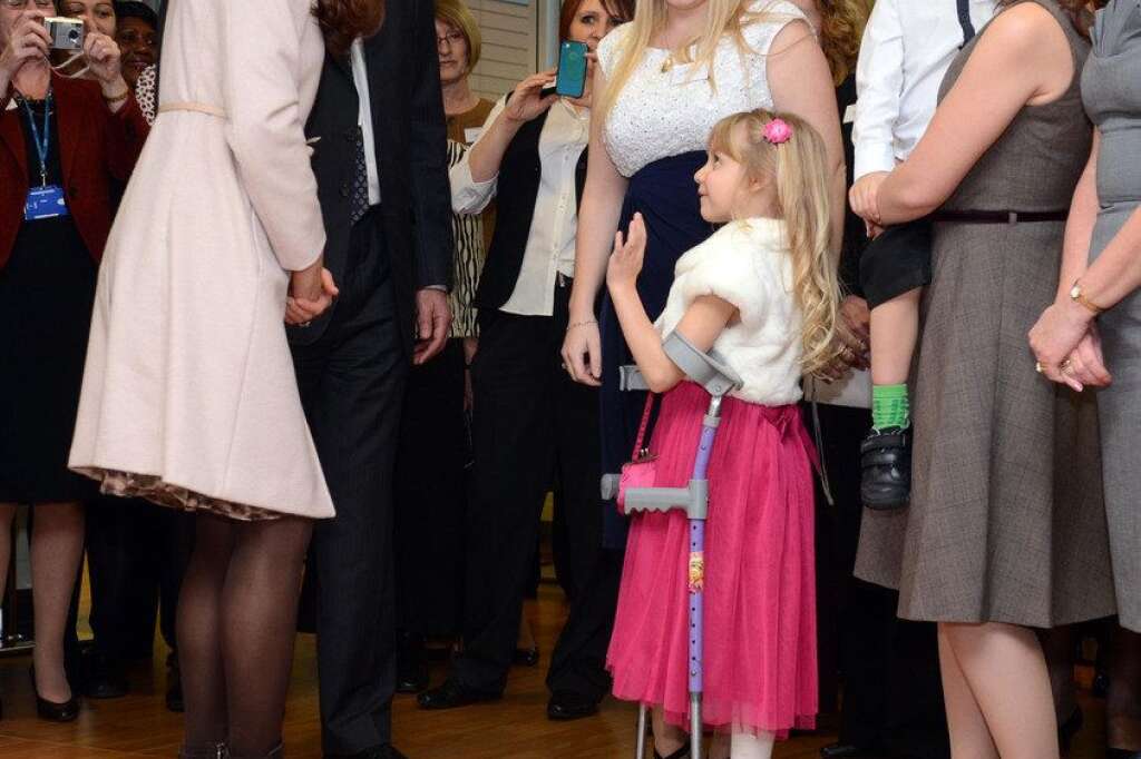 The Duke And Duchess Of Cambridge Official Visit To Peterborough - Catherine, Duchess of Cambridge meets Emma Henson , aged 7 at Peterborough City Hospital during an official visit to Peterborough on November 28, 2012 in Peterborough,  England.