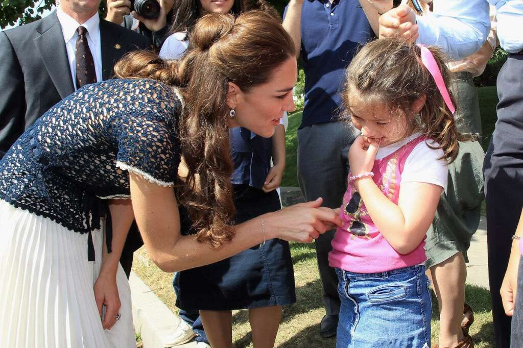 Reception To Mark Launch Of Tusk's US Patrons Circle - LOS ANGELES, CA - JULY 10:  Catherine, Duchess of Cambridge meets a young member of the public during an impromptu walkabout outside their residence on July 10, 2011 in Los Angeles, California. The newly married Royal Couple are on the final day of their first joint overseas tour to the USA. They arrived on Friday after spending 9 days in Canada. The couple started off their tour of North America by joining millions of Canadians in taking part in Canada Day celebrations which mark Canada's 144th Birthday.  (Photo by Chris Jackson/Getty Images)