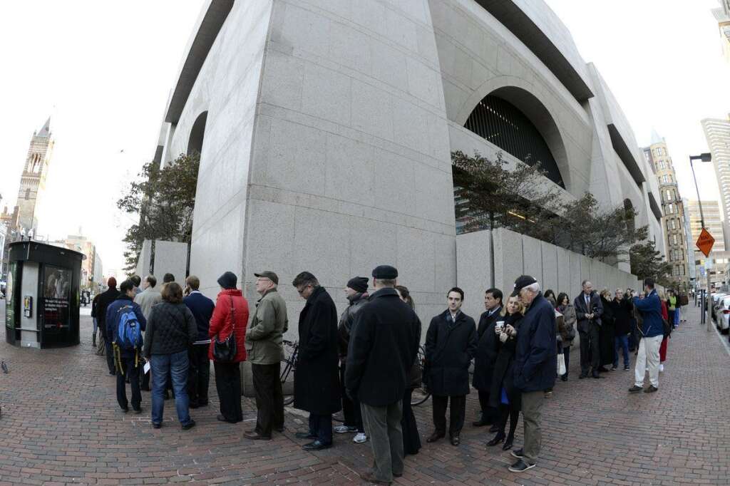 US - VOTE - 2012 - BOSTON - Voters line up to cast their vote at the Boston Public Library  November 6, 2012 in Boston, Massachusetts.  The final national polls showed an effective tie, with either US President Barack Obama or Republican challenger Mitt Romney favored by a single point in most surveys. AFP PHOTO / TIMOTHY A. CLARY        (Photo credit should read TIMOTHY A. CLARY/AFP/Getty Images)