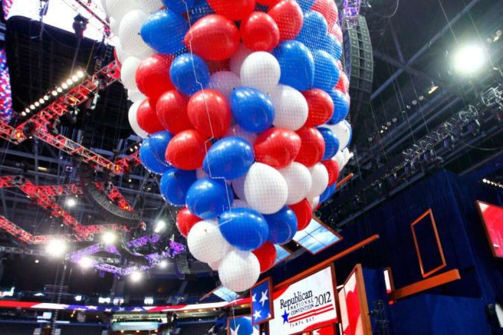 Riggers load nets full of balloons for the Republican National Convention festivities inside the Tampa Bay Times Forum, Friday, Aug. 24, 2012, in Tampa, Fla. (AP Photo/J. Scott Applewhite)