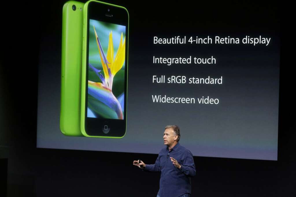 Keynote Apple - Phil Schiller, Apple's senior vice president of worldwide product marketing, speaks on stage during the introduction of the new iPhone 5c in Cupertino, Calif., Tuesday, Sept. 10, 2013. (AP Photo/Marcio Jose Sanchez)