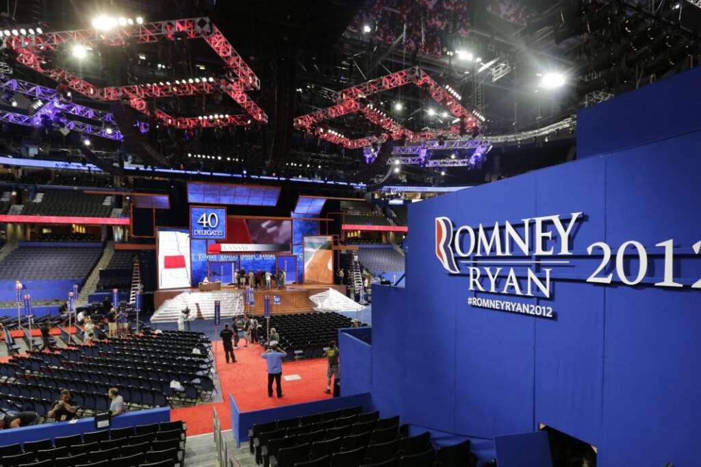 Workers prepare the stage for the Republican National Convention inside the Tampa Bay Times Forum in Tampa, Fla., on Saturday, Aug. 25, 2012. The political convention begins on Monday, Aug. 27th. (AP Photo/Dave Martin)