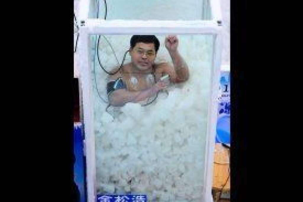 - Chinese "Iceman" Jin Songhao stands in a plastic box during a cold endurance competition in Zhangjiajie, central China's Hunan Province, on Jan. 3. Jin Songhao dwarfed Wim Hof's world record for the longest ice bath by immersing himself in ice for 120 minutes wearing nothing but a swimsuit.