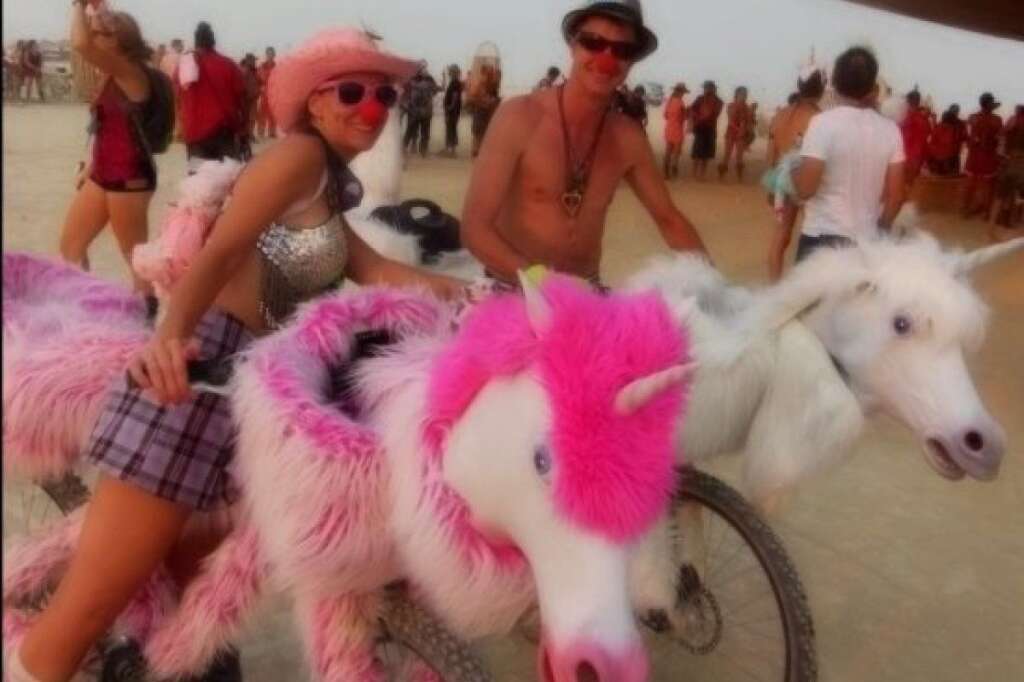What are these clowns riding? Unicorns! - <a href="http://www.huffingtonpost.com/social/Kevin_Ells"><img style="float:left;padding-right:6px !important;" src="http://graph.facebook.com/612724873/picture?type=square" /></a><a href="http://www.huffingtonpost.com/social/Kevin_Ells">Kevin Ells</a>:<br />During the Unicorn Rampage at Burning Man