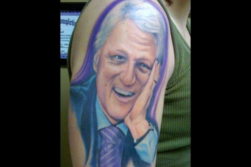 Bill Clinton - Bubba's dreamy gaze really comes through on an inked up bicep.    <em><a href="http://godfatherofgreenbay.xanga.com/photos/870ff281675986/" target="_hplink">(source)</a></em>