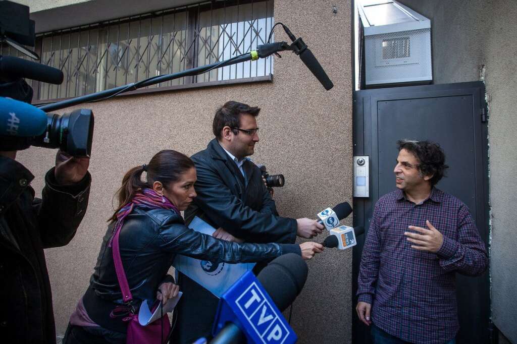 - Israeli writer Etgar Keret talks to journalists at the entrance of the Etgar House, allegedly one of the world’s narrowest houses, a day ahead of its official opening on October 19, 2012 in Warsaw, in the former Jewish Ghetto neighbourhood. (WOJTEK RADWANSKI/AFP/Getty Images)