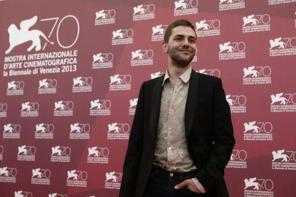 Le style coloré de Xavier Dolan - Director Xavier Dolan poses for photographers at the Tom A La Ferme photo call at the 70th edition of the Venice Film Festival held from Aug. 28 through Sept. 7, in Venice, Italy, Monday, Sept. 2, 2013. (AP Photo/David Azia)