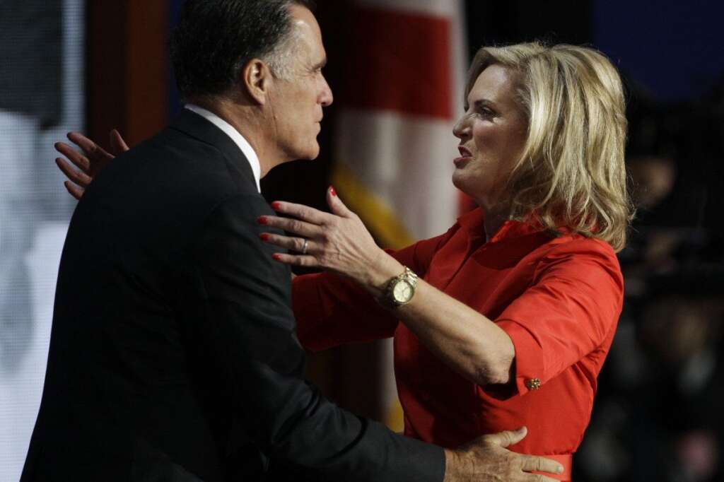 Mitt Romney, Ann Romney - U.S. Republican presidential nominee Mitt Romney hugs his wife Ann after she addressed the Republican National Convention in Tampa, Fla., on Tuesday, Aug. 28, 2012. (AP Photo/Charlie Neibergall)