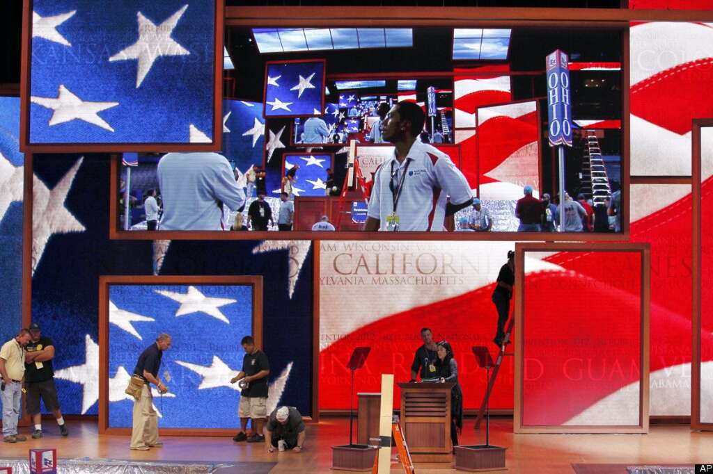 Workers prepare the stage for the Republican National Convention inside the Tampa Bay Times Forum, Saturday, Aug. 25, 2012, in Tampa, Fla. (AP Photo/J. Scott Applewhite)