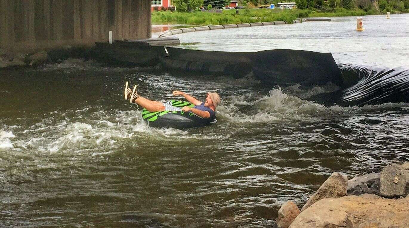 Mitch tubing down the Deschutes River in Bend, Oregon.