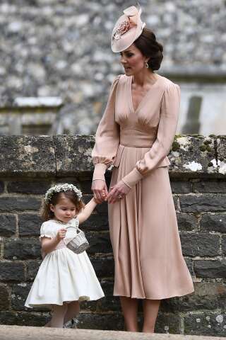 La duchesse de Cambridge et sa fille Charlotte au mariage de Pippa Middleton, le 20 mai.