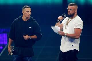 (FILES) This file photo taken on April 12, 2018 in Berlin shows German rappers Kollegah & Farid Bang receiving the 
