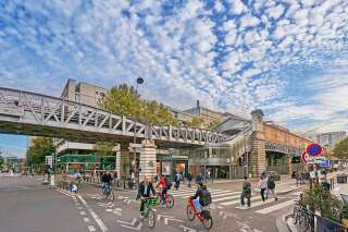 Paris, France - September 28, 2021: Pedestrians and traffic at the Quai de la Gare metro station in Paris.
