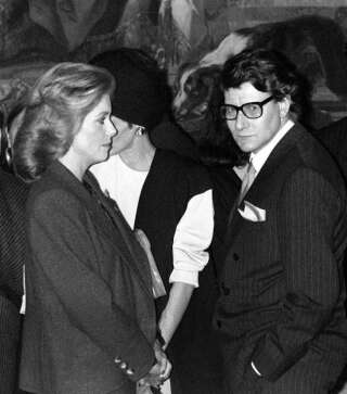 Yves Saint Laurent et Catherine Deneuve lors d'une réception au Palais de l'Élysée le 17 octobre 1984.