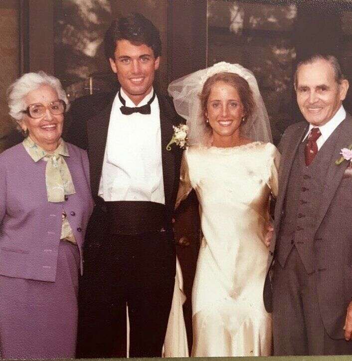 Marta Prietto O'Hara with her grandma Maria Teresa (a.k.a Grande) and grandpa Manuel Moreno. In addition to the wedding dress, Grande (left) made the suit and blouse she is wearing in this photo.
