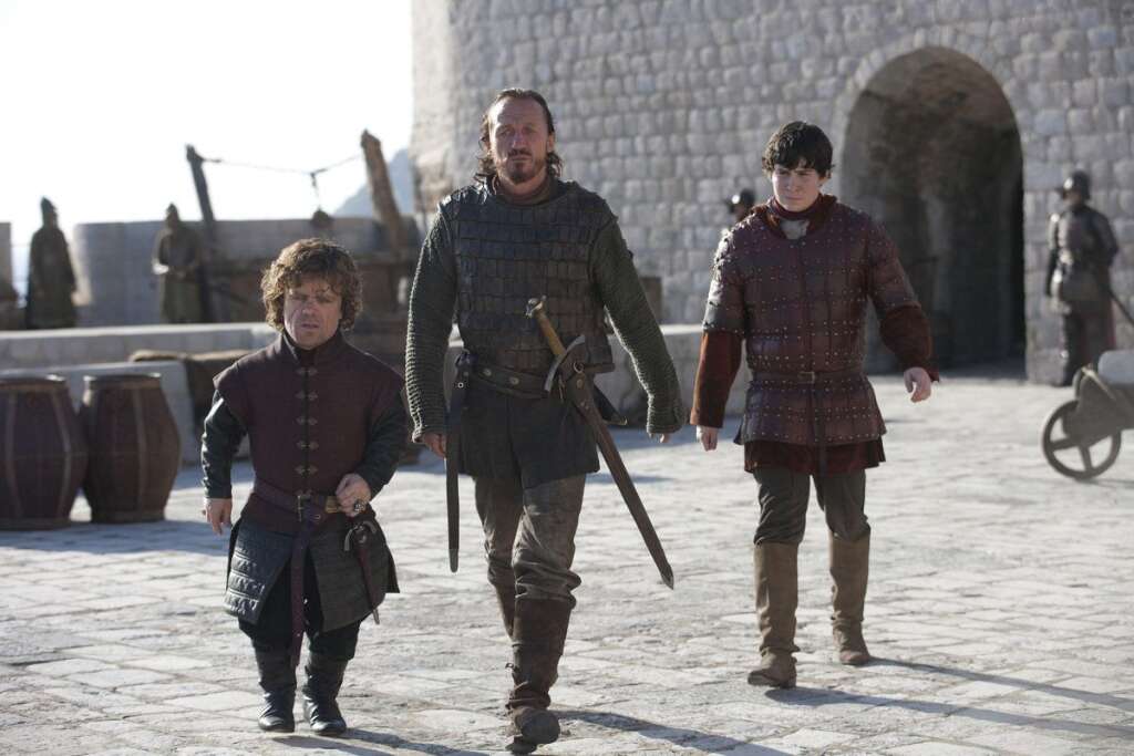 'Game Of Thrones' Season 3 - Peter Dinklage as Tyrion Lanniser, Jerome Flynn as Bronn, and Daniel Portman as Podrick Payne