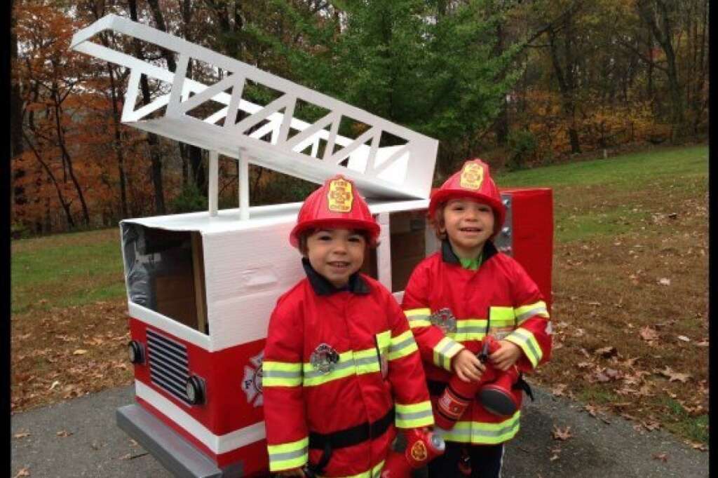 Firefighters Ethan and Riley - <a href="http://www.huffingtonpost.com/social/laurajblake"><img style="float:left;padding-right:6px !important;" src="http://graph.facebook.com/1468806955/picture?type=square" /></a><a href="http://www.huffingtonpost.com/social/laurajblake">laurajblake</a>:<br />Firefighters Ethan and Riley