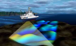 Navire de sondage équipés de sonars multifaisceaux pour cartographier la profondeur du fond marin en transmettant le son en éventail, puis en écoutant les réflexions sur le fond marin.