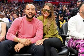 LOS ANGELES, CALIFORNIA - MARCH 08: John Legend and Chrissy Teigen attend a basketball game between the Los Angeles Clippers and the Los Angeles Lakers at Staples Center on March 08, 2020 in Los Angeles, California. (Photo by Allen Berezovsky/Getty Images)
