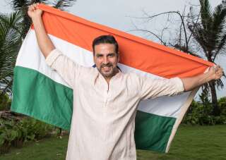 MUMBAI, INDIA - AUGUST 10: Bollywood actor Akshay Kumar poses with Indian flag for Independence Day shoot, on August 10, 2016 in Mumbai, India. (Photo by Aalok Soni/ Hindustan Times via Getty Images)