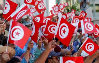 Des Tunisiens manifestent contre le projet de Constitution de Kaïs Saïed, dont le référendum a lieu le 25 juillet 2022.