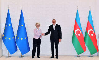 Azerbaijan President Ilham Aliyev shakes hands with European Commission President Ursula von der Leyen during a meeting in Baku, Azerbaijan, July 18, 2022. Official web-site of the President of the Republic of Azerbaijan/Handout via REUTERS ATTENTION EDITORS - THIS IMAGE IS SUPPLIED BY A THIRD PARTY.  NO RESALES.  NO ARCHIVES.  MANDATORY CREDIT.