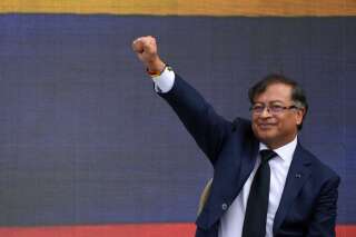 Colombia's President-elect Gustavo Petro gestures during his inauguration ceremony at the Bolivar square in Bogota, on August 7, 2022. - Ex-guerrilla and former mayor Gustavo Petro will be sworn in as Colombia's first-ever leftist president, with plans for profound reforms in a country beset by economic inequality and drug violence. (Photo by JUAN BARRETO / AFP)