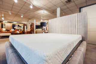 A Soft new mattress in showroom on sale for customers.