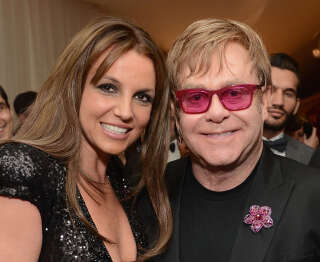 WEST HOLLYWOOD, CA - FEBRUARY 24:  (L-R) Recording Artist Britney Spears and Sir Elton John attend the 21st Annual Elton John AIDS Foundation Academy Awards Viewing Party at West Hollywood Park on February 24, 2013 in West Hollywood, California.  (Photo by Michael Kovac/Getty Images for EJAF)