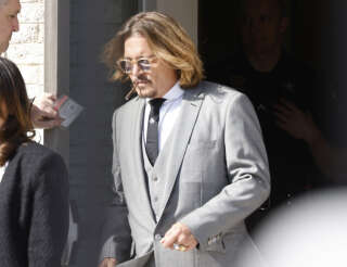 FAIRFAX, VIRGINIA - APRIL 11: Johnny Depp is seen outside court for the start of a civil trial at Fairfax County Circuit Court on April 11, 2022 in Fairfax, Virginia. Depp is seeking $50 million in alleged damages to his career over an op-ed Heard wrote in the Washington Post in 2018. (Photo by Paul Morigi/Getty Images)