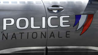 This picture taken in Rambouillet, south-west of Paris, on April 25, 2021 shows the logo of French National Police. (Photo by Bertrand GUAY / AFP)