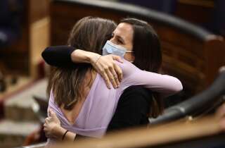 MADRID, SPAIN - MAY 26: The Minister of Equality, Irene Montero, and the Minister of Social Rights and Agenda 2030, Ione Belarra, embrace during a plenary session in the Congress of Deputies, on 26 May, 2022 in Madrid, Spain. During today's plenary session, the so-called 'law of the only yes is yes' was approved, in which express consent will be key to judge sexual crimes. The law also recognizes sexual violence as sexist, punishing street harassment, mutilation, forced marriage, digital violence, and for the first time, it also accepts sexual exploitation and trafficking as forms of violence against women. In addition, the law considers chemical submission as a form of sexual assault and will prohibit the advertising of prostitution and punish with imprisonment the dissemination of intimate photos and videos. (Photo By Eduardo Parra/Europa Press via Getty Images)
