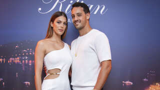 Iris Mittenaere and Diego El Glaoui pose for photographers upon arrival at the Killian Paris Kool Yacht Party, during the 75th Cannes international film festival, Cannes, southern France, Friday, May 27, 2022. (Photo by Vianney Le Caer/Invision/AP)