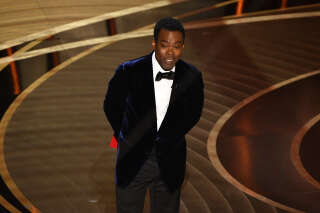US actor Chris Rock speaks onstage during the 94th Oscars at the Dolby Theatre in Hollywood, California on March 27, 2022. (Photo by Robyn Beck / AFP)