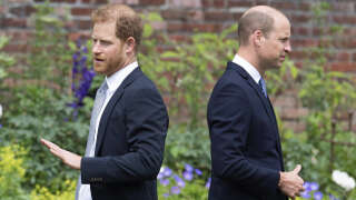 Prince Harry, left, and Prince William stand together during the unveiling of a statue they commissioned of their mother Princess Diana, on what woud have been her 60th birthday, in the Sunken Garden at Kensington Palace, London, Thursday July 1, 2021. (Dominic Lipinski /Pool Photo via AP)
