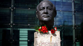 Roses are placed on a sculpture of Mikhail Gorbachev in memory of the final leader of the Soviet Union, at the 