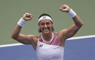 France's Caroline Garcia celebrates match point against USA's Alison Riske during their 2022 US Open Tennis tournament women's singles Round of 16 match at the USTA Billie Jean King National Tennis Center in New York, on September 4, 2022. (Photo by KENA BETANCUR / AFP)