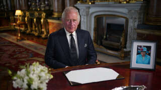 Britain's King Charles III makes a televised address to the Nation and the Commonwealth from the Blue Drawing Room at Buckingham Palace in London on September 9, 2022, a day after Queen Elizabeth II died at the age of 96. - Queen Elizabeth II, the longest-serving monarch in British history and an icon instantly recognisable to billions of people around the world, died at her Scottish Highland retreat on September 8. (Photo by Yui Mok / POOL / AFP)