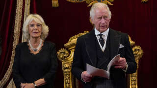 Britain's Camilla, Queen Consort (L) listens as Britain's King Charles III speaks during a meeting of the Accession Council inside St James's Palace in London on September 10, 2022, to proclaim him as the new King. - Britain's Charles III was officially proclaimed King in a ceremony on Saturday, a day after he vowed in his first speech to mourning subjects that he would emulate his 
