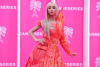 French singer and influencer Bilal Hassani poses on the pink carpet during the closing night of the 5th MCannes (Canneseries) International Series Festival in Cannes, southern France, on April 6, 2022. (Photo by Valery HACHE / AFP )