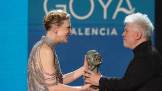 Australian-US actress Cate Blanchett receives an International Goya award from Spanish film director Pedro Almodovar at the 36th Goya awards ceremony at the Palau de les Arts in Valencia, on February 12, 2022. (Photo by JOSE JORDAN / AFP)