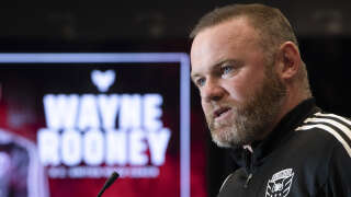 British soccer star Wayne Rooney speaks during a press conference where he was announced as the new Head Coach of Major League Soccer's DC United at Audi Field in Washington, DC, on July 12, 2022. - Former England and Manchester United star Wayne Rooney was named on Tuesday as the new head coach of DC United and tasked with reviving the moribund Major League Soccer team. (Photo by ROBERTO SCHMIDT / AFP)