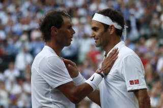 Roger Federer consoles Rafael Nadal on day eleven of the Wimbledon Championships at the All England Lawn Tennis and Croquet Club, Wimbledon. (Photo by Adrian Dennis/PA Images via Getty Images)