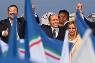 (From L) Lega leader Matteo Salvini, Forza Italia leader Silvio Berlusconi and Brothers of Italy leader Giorgia Meloni unite on stage on September 22, 2022 at the end of a joint rally of Italy's right-wing parties Brothers of Italy (Fratelli d'Italia, FdI), the League (Lega) and Forza Italia at Piazza del Popolo in Rome, ahead of the September 25 general election. (Photo by Andreas SOLARO / AFP)