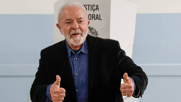 SAO BERNARDO DO CAMPO, BRAZIL - OCTOBER 02: Former president of Brazil and Candidate of Worker's Party (PT) Luiz Inacio Lula da Silva gestures to the journalists after voting during general elections day on October 02, 2022 in Sao Bernardo do Campo, Brazil. After a polarized campaign between Lula and Bolsonaro, the largest Latin American nation votes for president amid an economic crisis. (Photo by Alexandre Schneider/Getty Images)