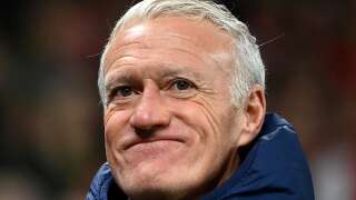 French head coach Didier Deschamps reacts at the end of the UEFA Nations League football match between Denmark and France in Copenhagen on September 25, 2022. (Photo by FRANCK FIFE / AFP)