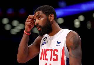 NEW YORK, NEW YORK - OCTOBER 29:  Kyrie Irving #11 of the Brooklyn Nets reacts in the fourth quarter against the Indiana Pacers at Barclays Center on October 29, 2022 in the Brooklyn borough of New York City. The Indiana Pacers defeated the Brooklyn Nets 125-116. NOTE TO USER: User expressly acknowledges and agrees that, by downloading and or using this photograph, User is consenting to the terms and conditions of the Getty Images License Agreement. (Photo by Elsa/Getty Images)