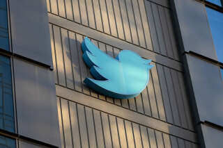 (FILES) In this file photo taken on October 28, 2022, the Twitter logo is seen on the exterior of the Twitter headquarters in San Francisco, California.  - An organized trolling campaign tweeting slurs tens of thousands of times tested Twitter's moderation policies after the platform was taken over by billionaire Elon Musk, its safety chief said October 29, 2022, adding that the rules 