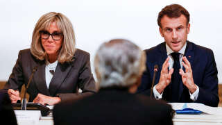 French First Lady Brigitte Macron and French President Emmanuel Macron attend a round-table on child-protection at the Elysee Palace as part of the Paris Peace Forum, in Paris, France November 10, 2022. Ludovic MARIN/Pool via REUTERS REFILE - QUALITY REPEAT