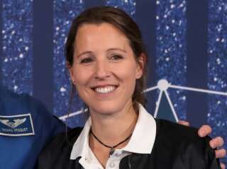 ESA newly recruited class of career astronaut, French Sophie Adenot, poses during a ceremony to unveil the European Space Agency new class of career astronauts in Paris on November 23, 2022. - ESA choose two women and three men from five different Western European countries out of more than 22,500 applicants. Adenot, 40, is an air helicopter test pilot with around 3,000 hours of flying experience. (Photo by Joël SAGET / AFP)